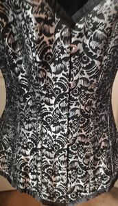 Black and silver steel boned corset.